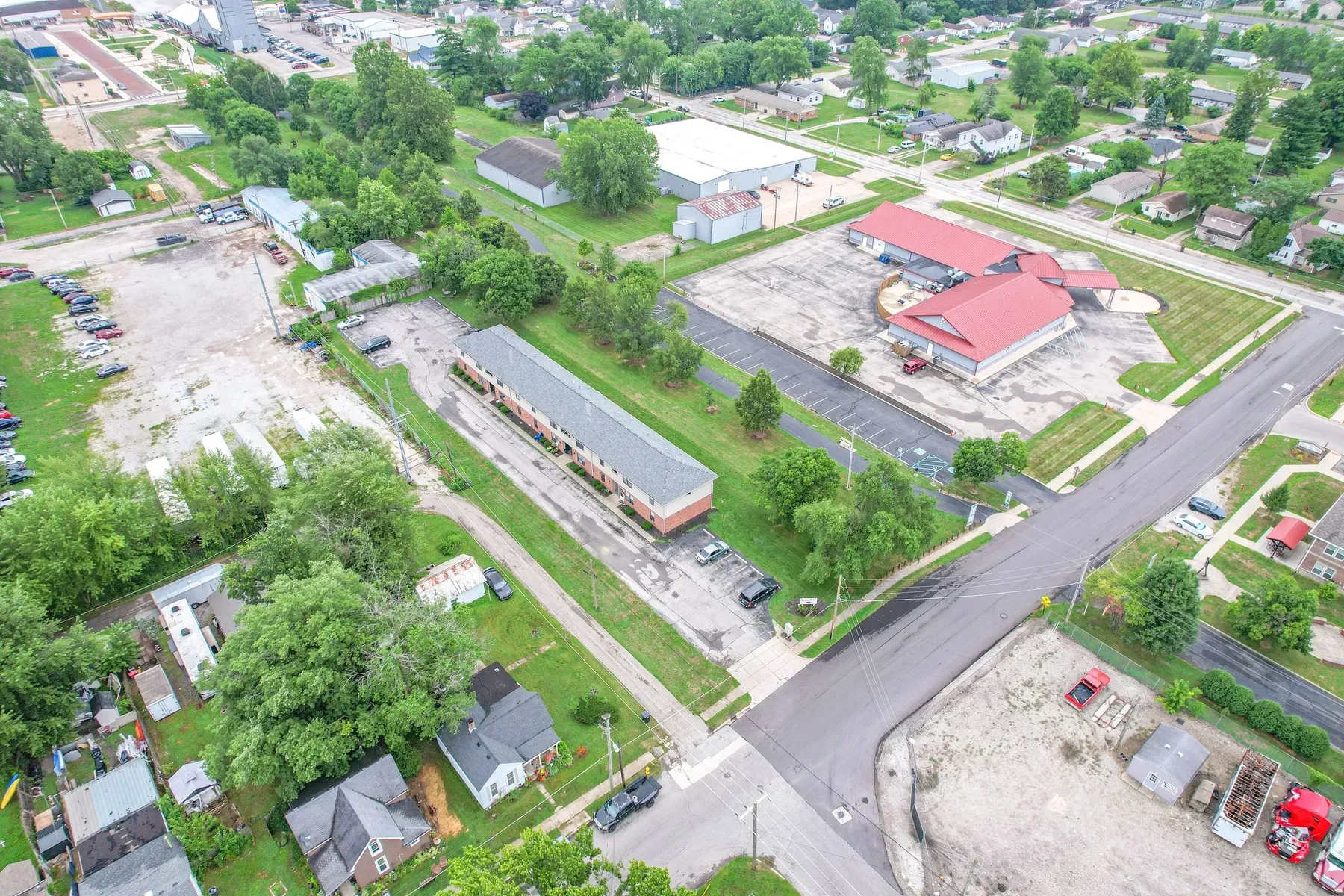 Aerial view of the brick apartment buildings and parking in Greenfield