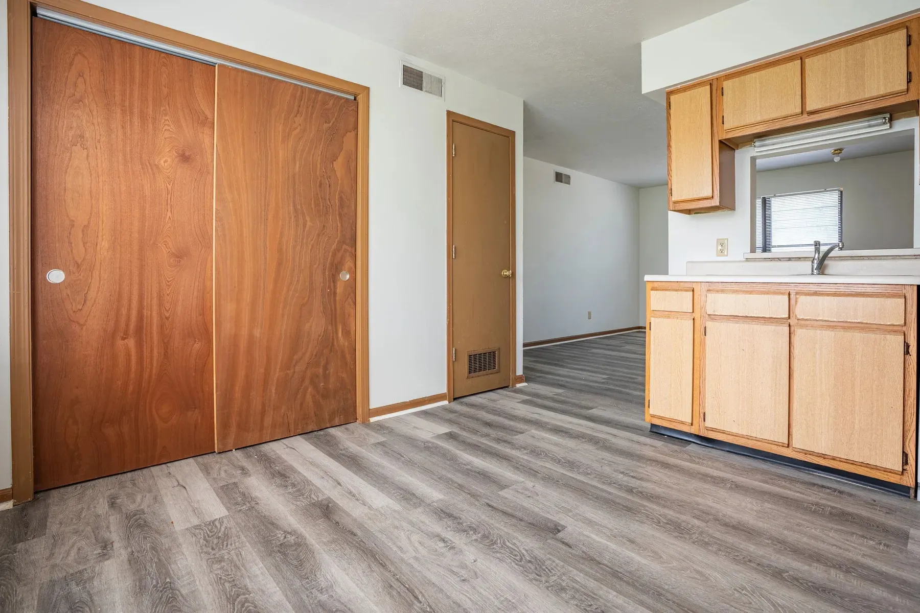 Apartment interior with wood-look flooring