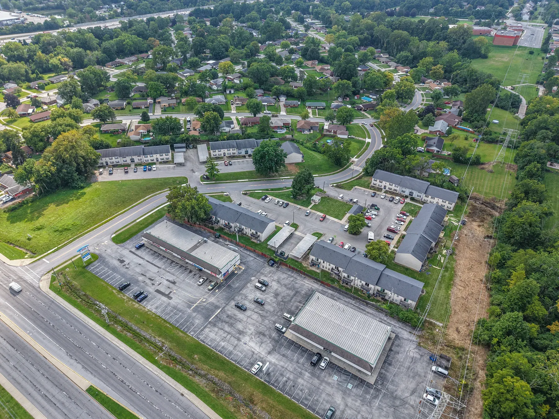 Aerial view of the apartment community and parking areas