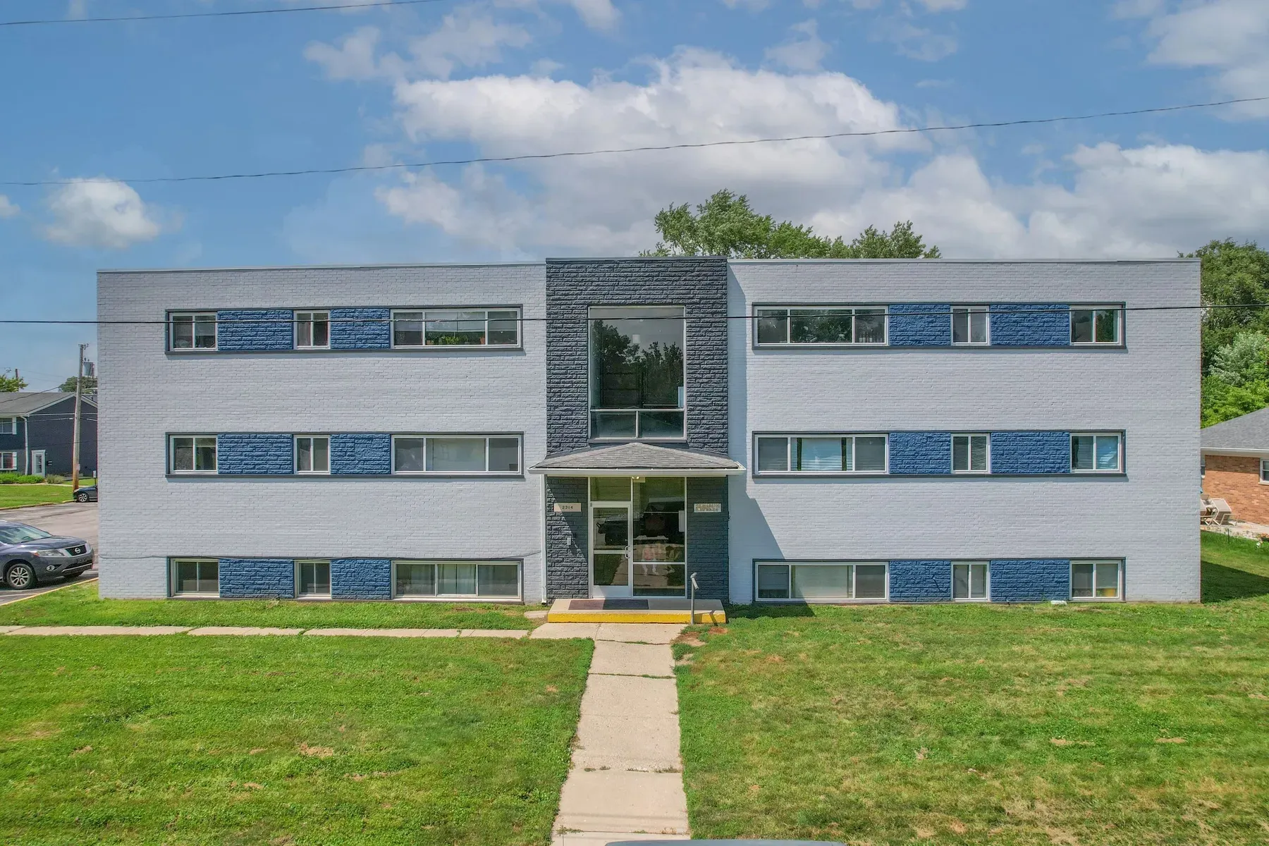 The two-story apartment building and front entrance in Beech Grove