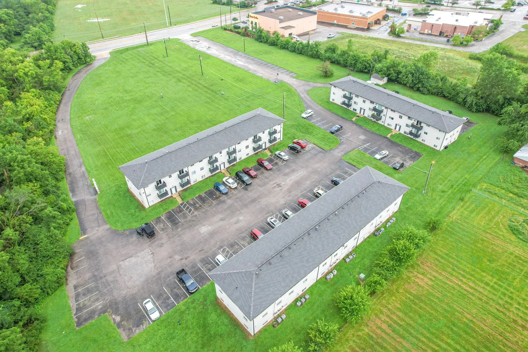 Aerial view of the apartment buildings and parking near Greenwood