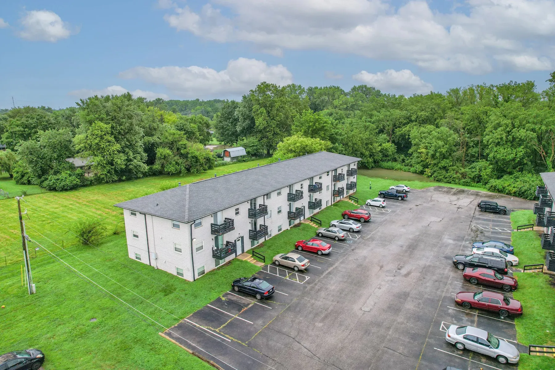 Aerial view of the buildings and parking lot