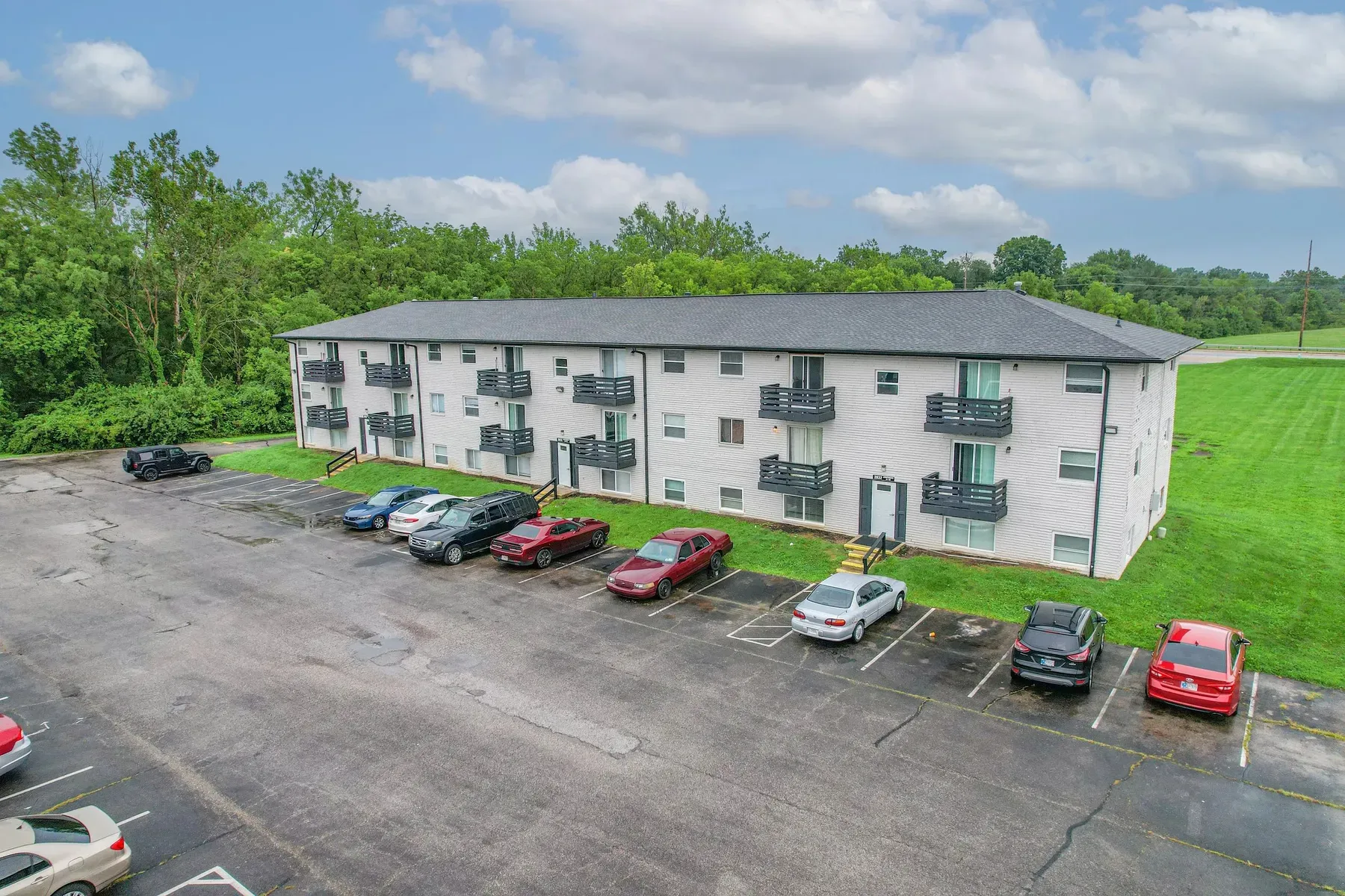 Aerial view of the three-story apartment buildings